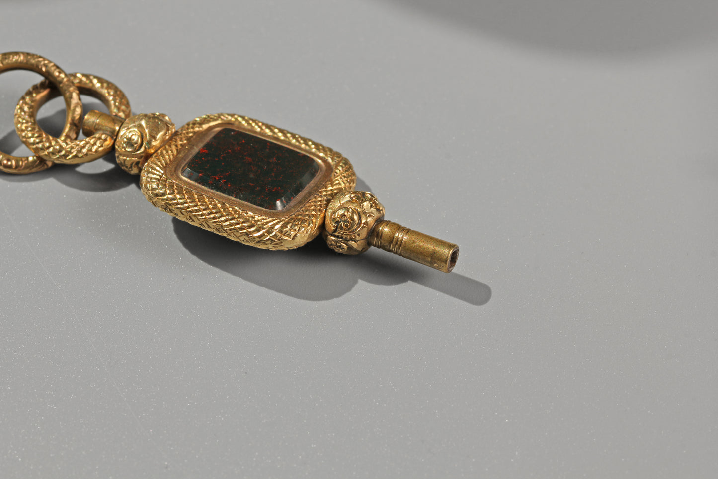 Antique bloodstone watch key with split ring, in 9 carat gold