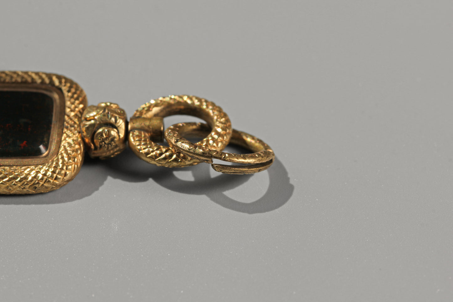 Antique bloodstone watch key with split ring, in 9 carat gold