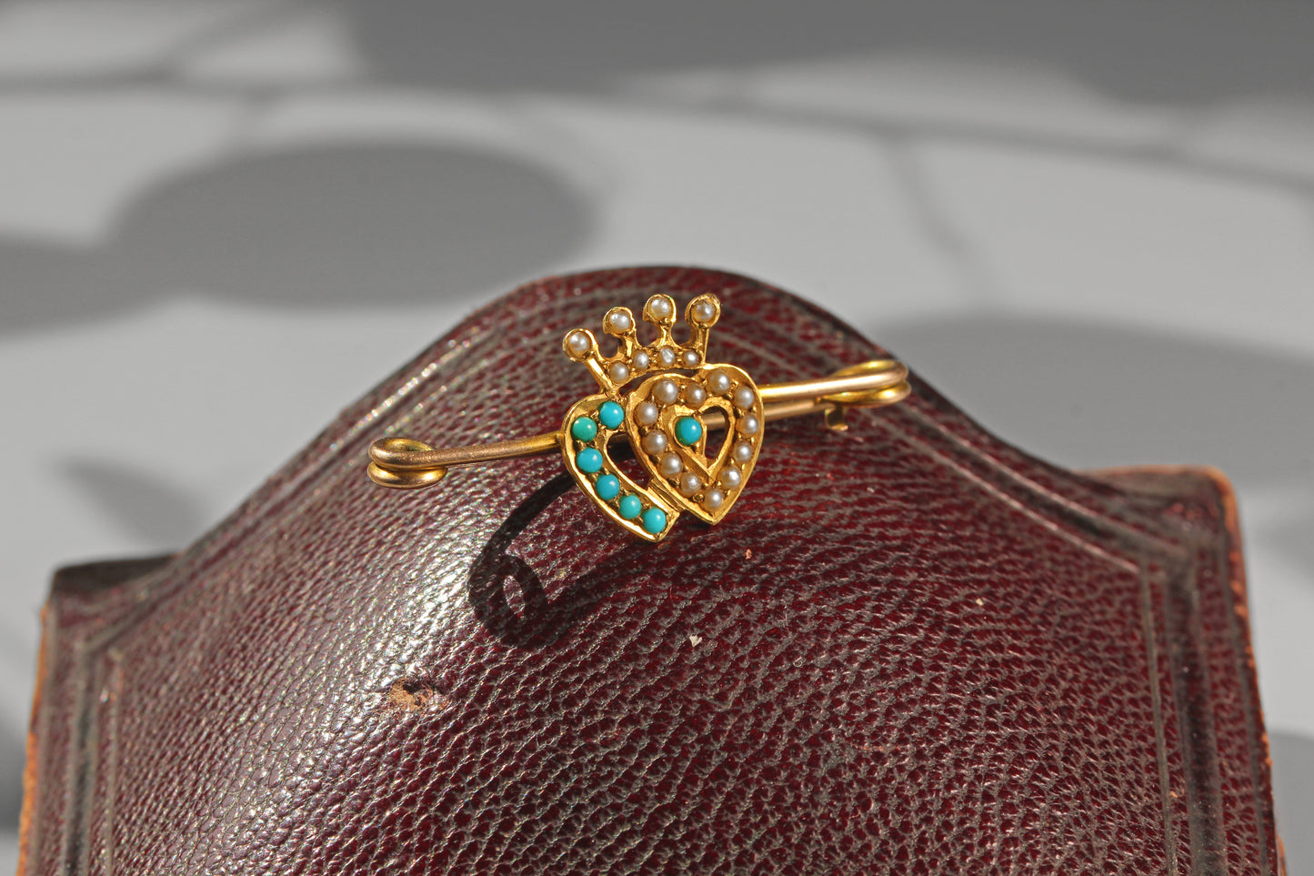 Victorian crowned heart bar brooch with turquoise cabochons and seed pearls in warm yellow gold
