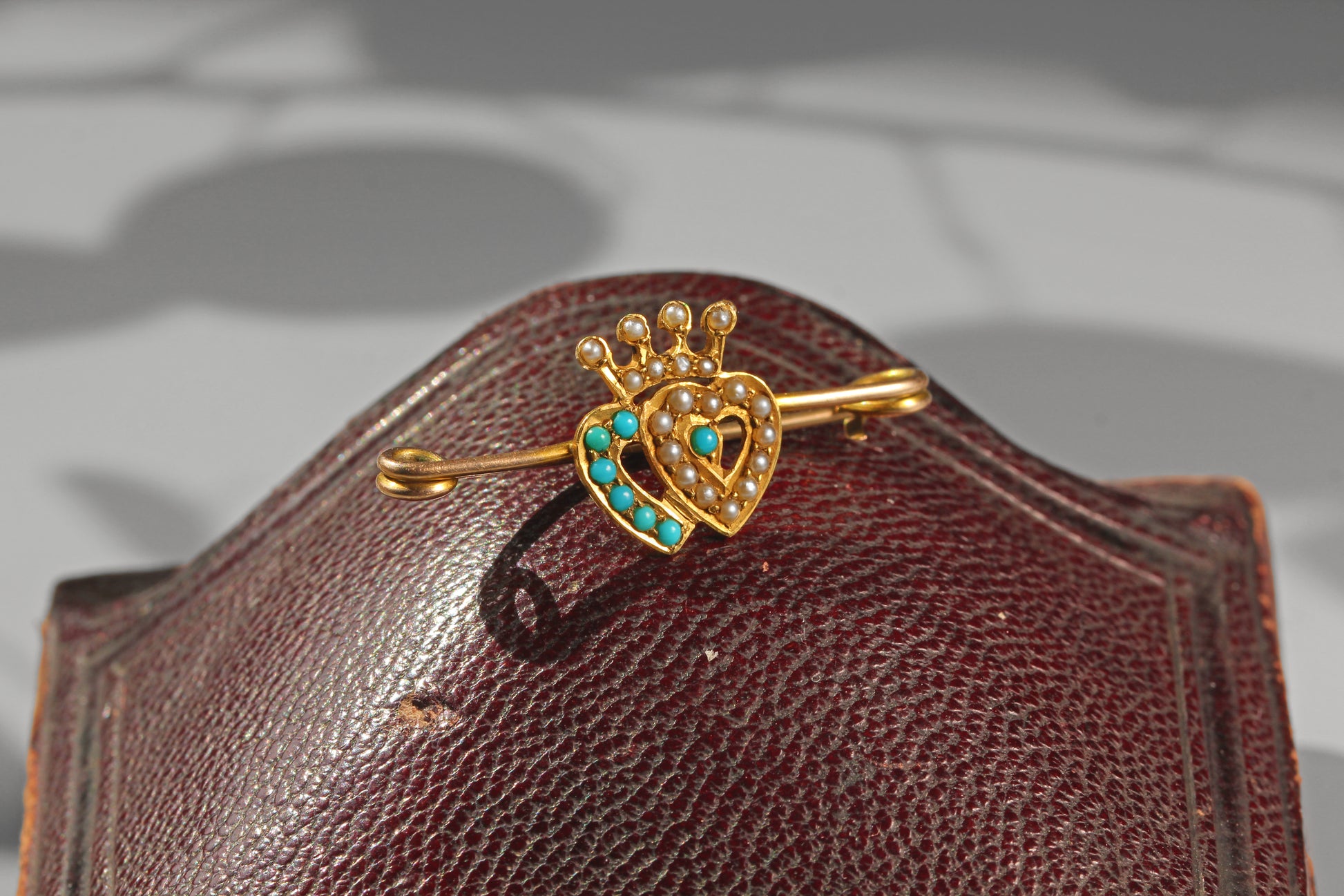 Victorian crowned heart bar brooch with turquoise cabochons and seed pearls in warm yellow gold
