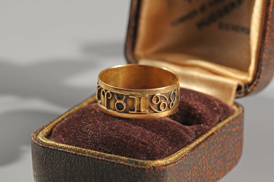 Vintage astrology inspired gold ring with zodiac motif cut out detailing
