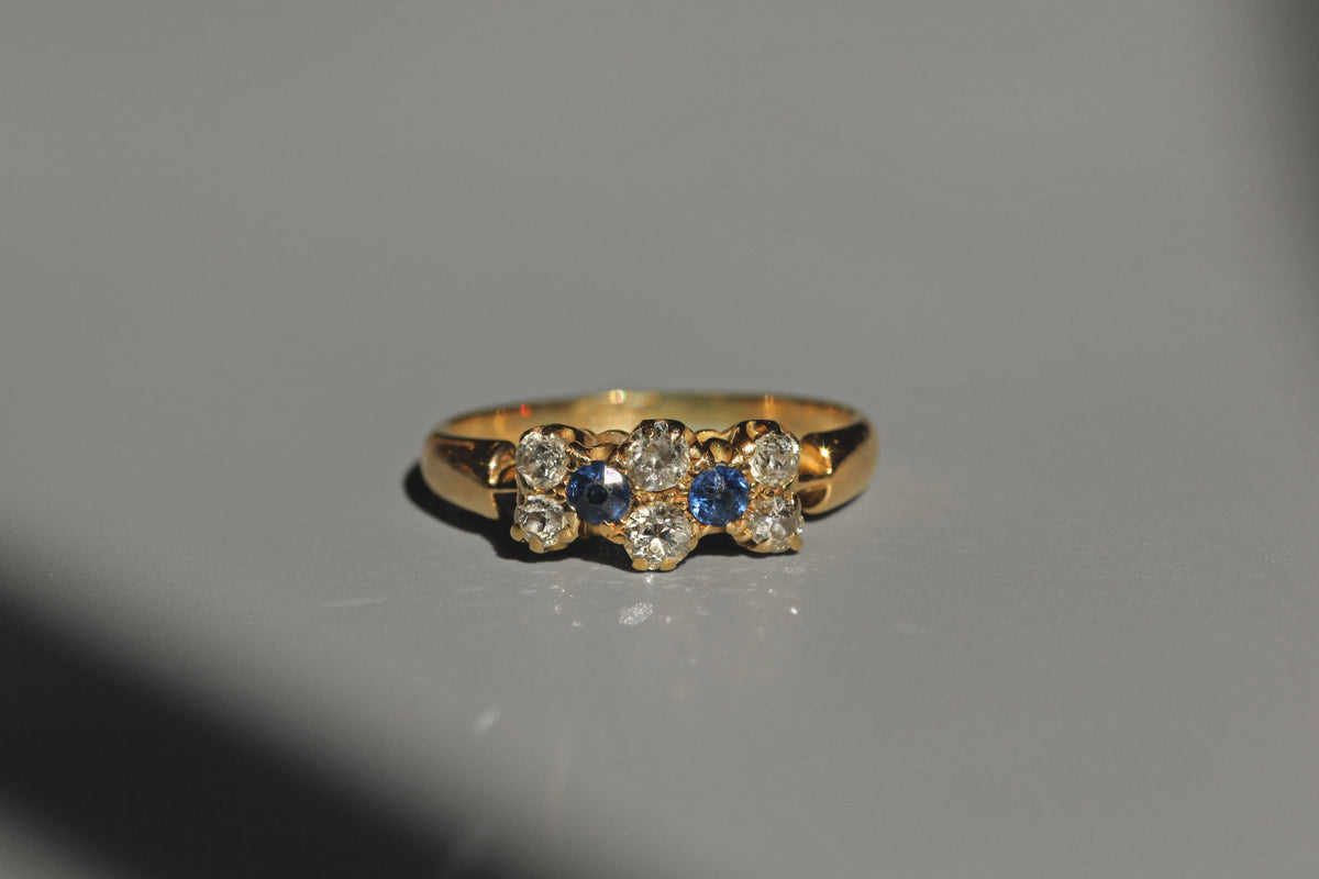 Antique Art Deco blue sapphire and old cut diamond ring in 18ct gold front view