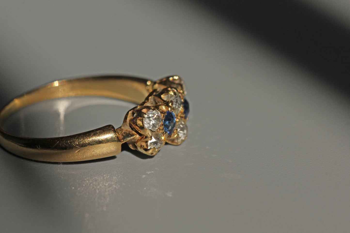 Antique art deco sapphire and old cut diamond ring, in 18 carat gold