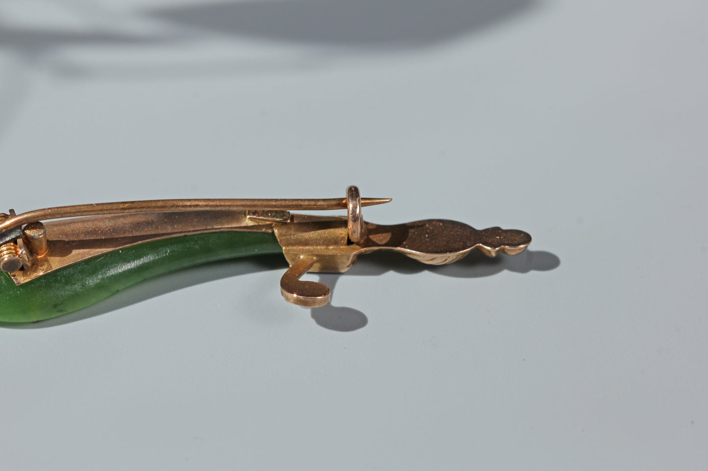 Antique nephrite, ruby & pearl scimitar brooch, in 9 carat gold