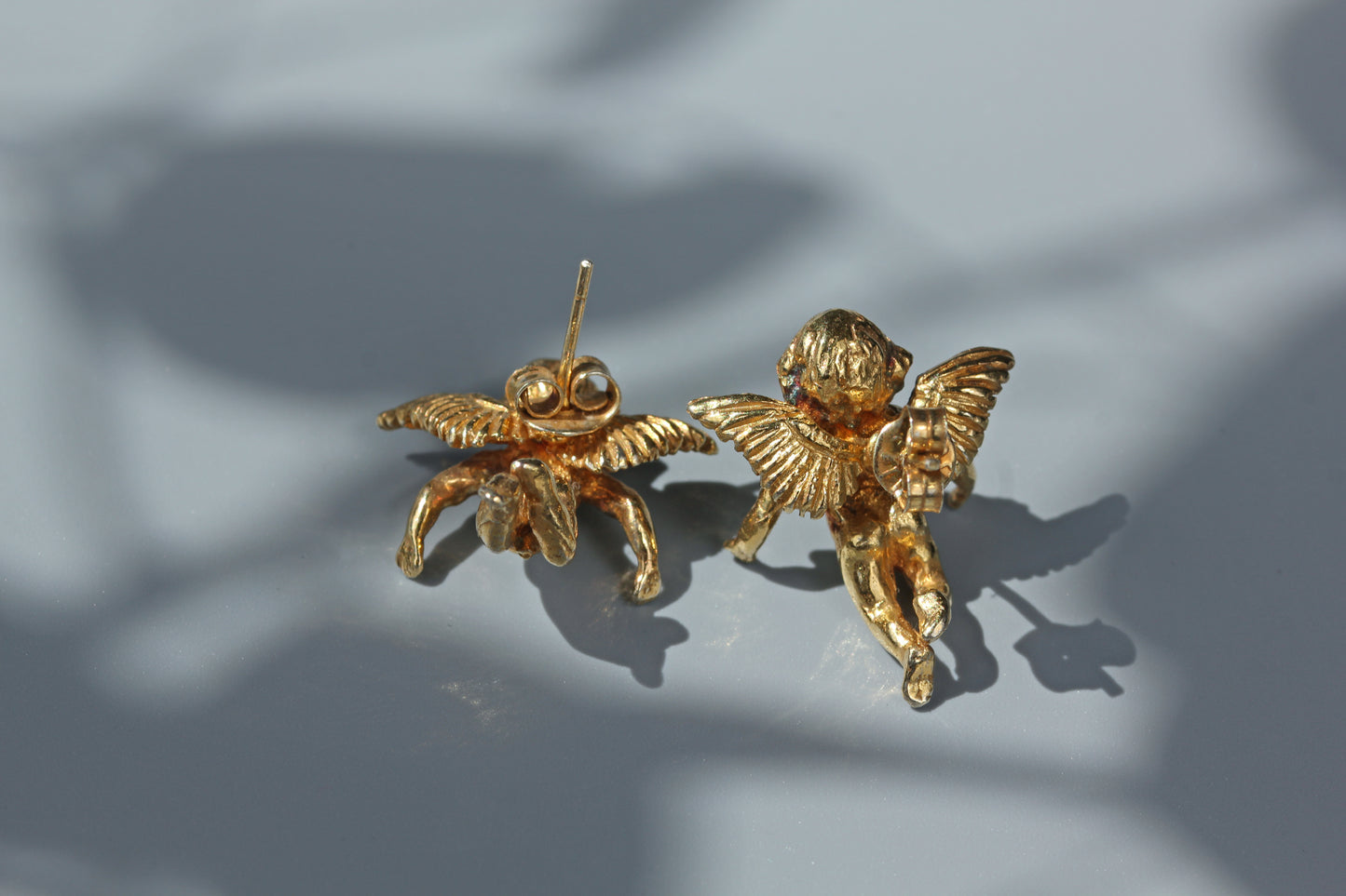 Vintage renaissance cherub stud earrings, in silver gilt