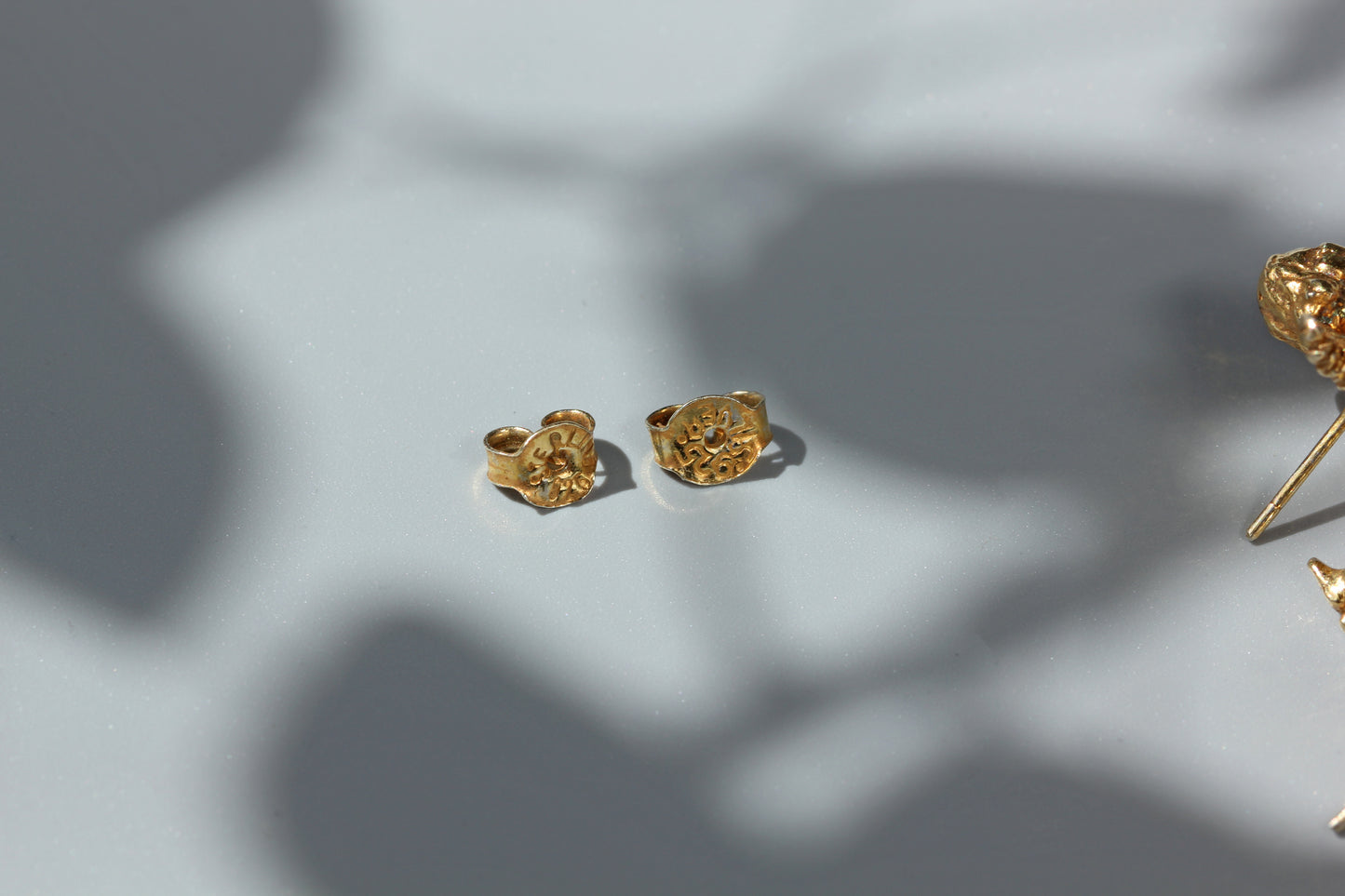 Vintage renaissance cherub stud earrings, in silver gilt