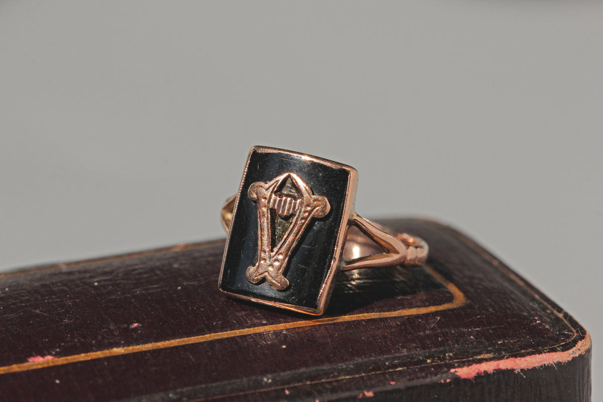 Edwardian antique onyx lyre ring in 9ct rose gold