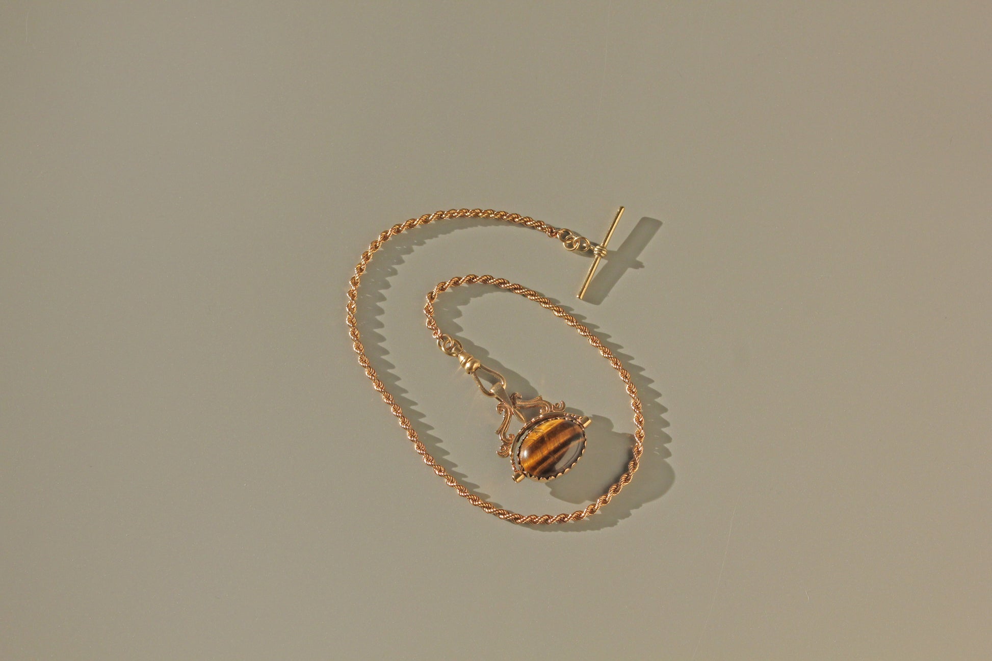 Antique chain with fob seal spinner pendant