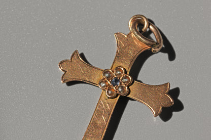 Antique victorian gold crucifix pendant with pearls and sapphire close up view