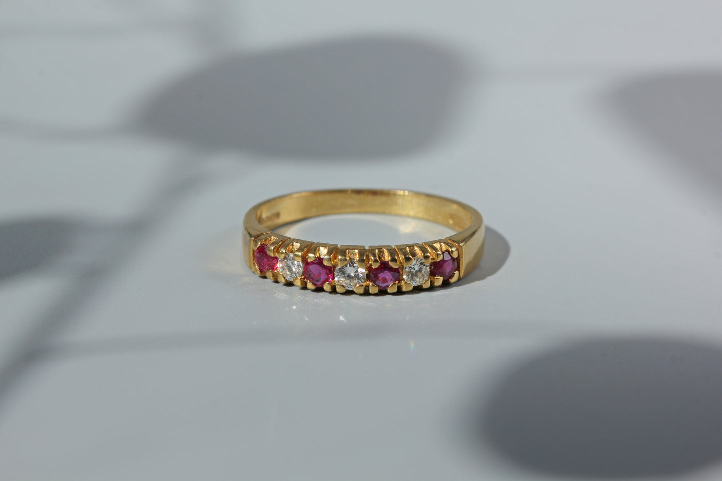 Vintage ruby & diamond half eternity ring, in 18ct gold