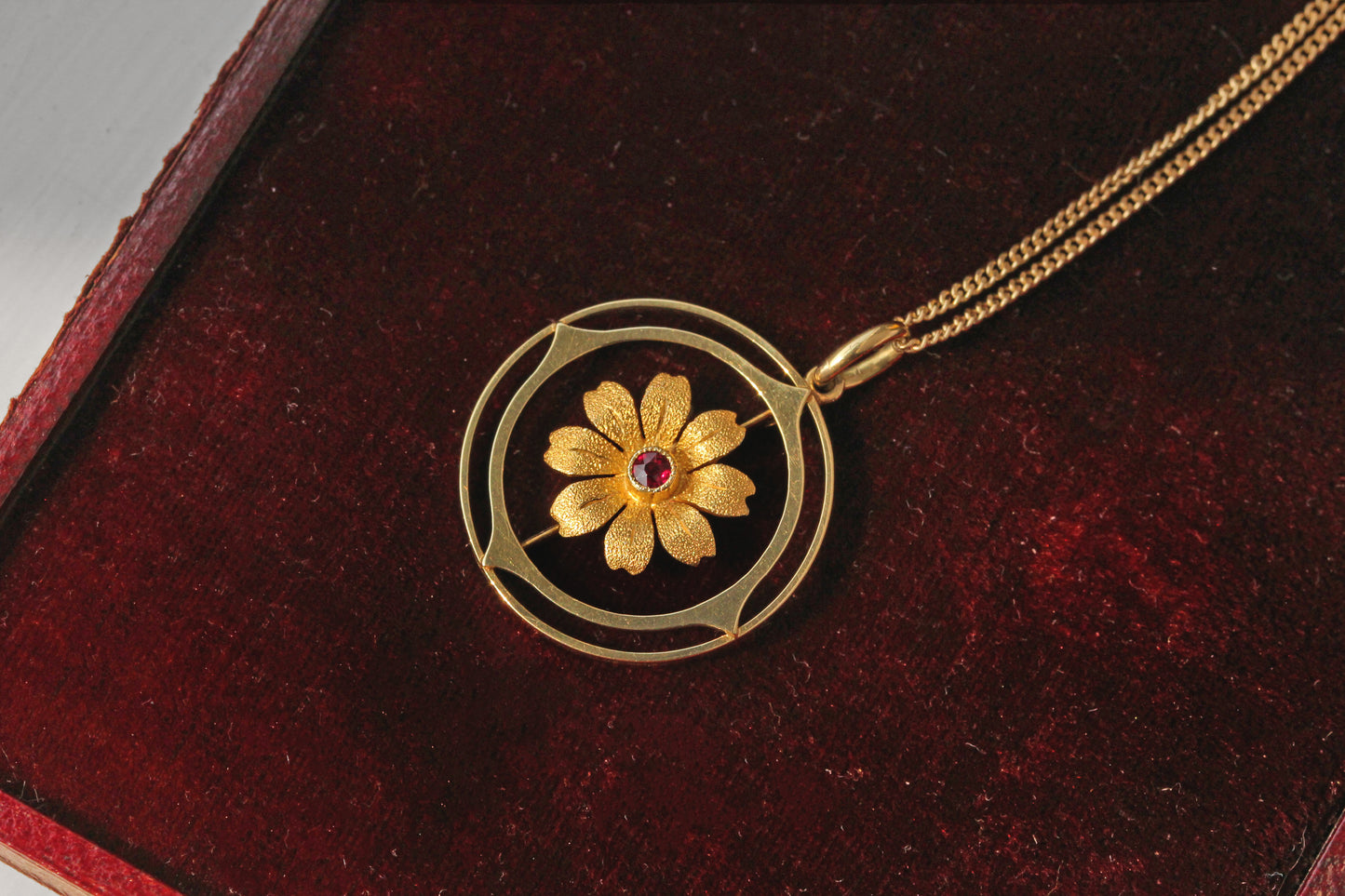 Antique victorian cosmos flower ruby pendant necklace, in 15 carat gold
