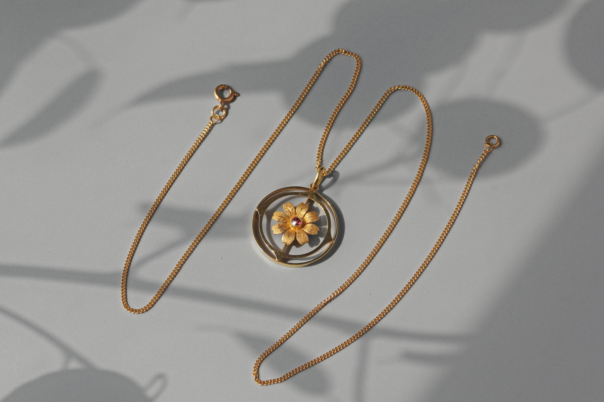 Antique victorian cosmos flower ruby pendant necklace, in 15 carat gold