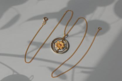 Antique victorian cosmos flower ruby pendant necklace, in 15 carat gold