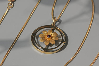 Antique victorian cosmos flower ruby pendant necklace, in 15 carat gold