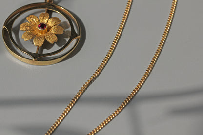 Antique victorian cosmos flower ruby pendant necklace, in 15 carat gold