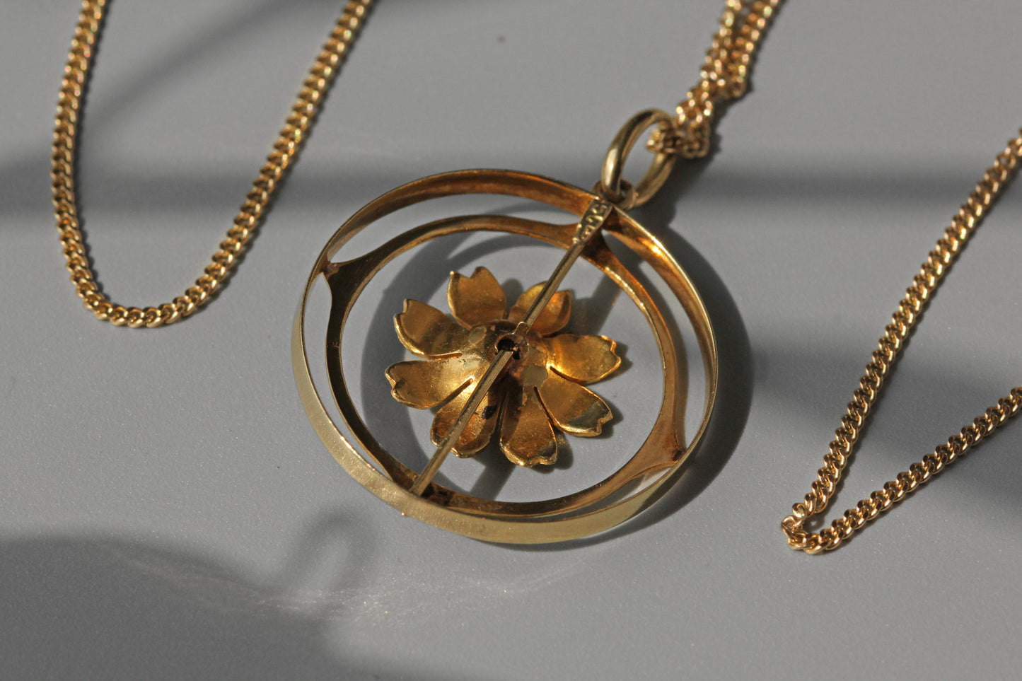 Antique victorian cosmos flower ruby pendant necklace, in 15 carat gold