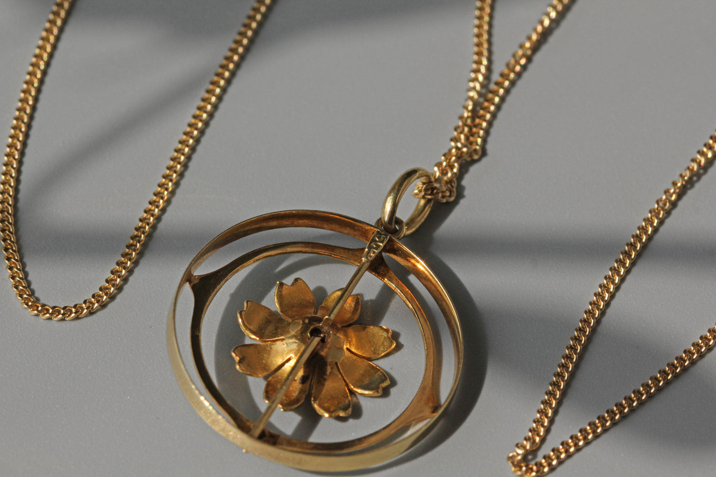 Antique victorian cosmos flower ruby pendant necklace, in 15 carat gold