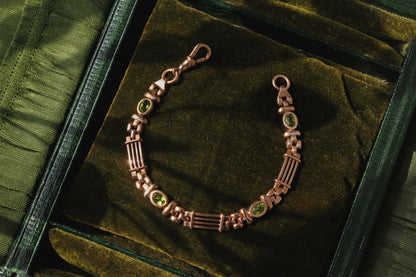 Vintage fancy link albert chain peridot bracelet, in 9 carat gold