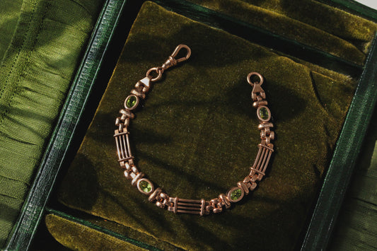 Vintage fancy link albert chain peridot bracelet, in 9 carat gold