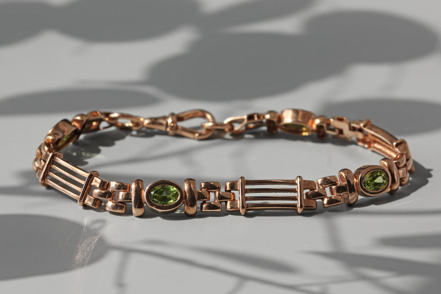 Vintage fancy link albert chain peridot bracelet, in 9 carat gold