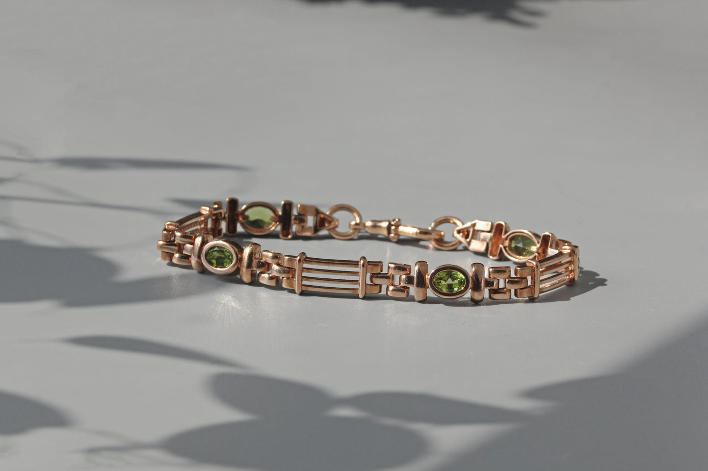 Vintage fancy link albert chain peridot bracelet, in 9 carat gold