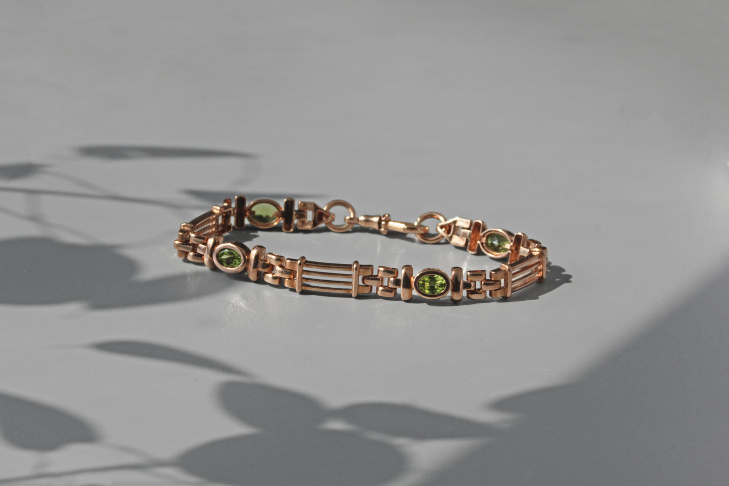 Vintage fancy link albert chain peridot bracelet, in 9 carat gold