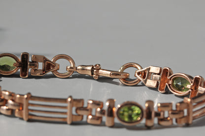 Vintage fancy link albert chain peridot bracelet, in 9 carat gold