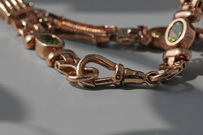 Vintage fancy link albert chain peridot bracelet, in 9 carat gold