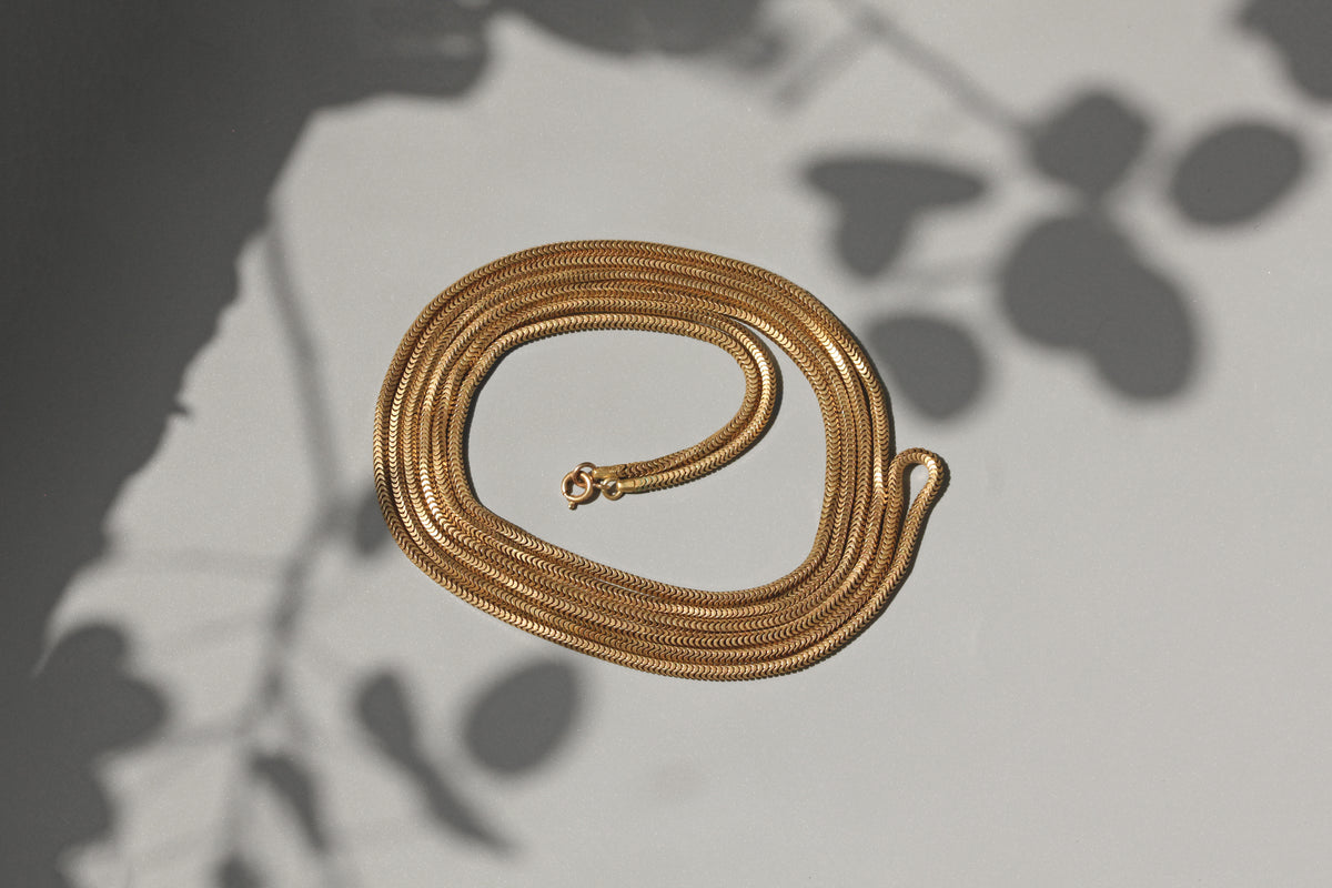 Antique snake link 70-inch necklace chain in gold pinchbeck