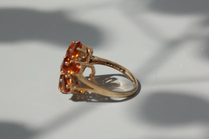 Vintage orange topaz flower cluster ring, in 9 carat gold