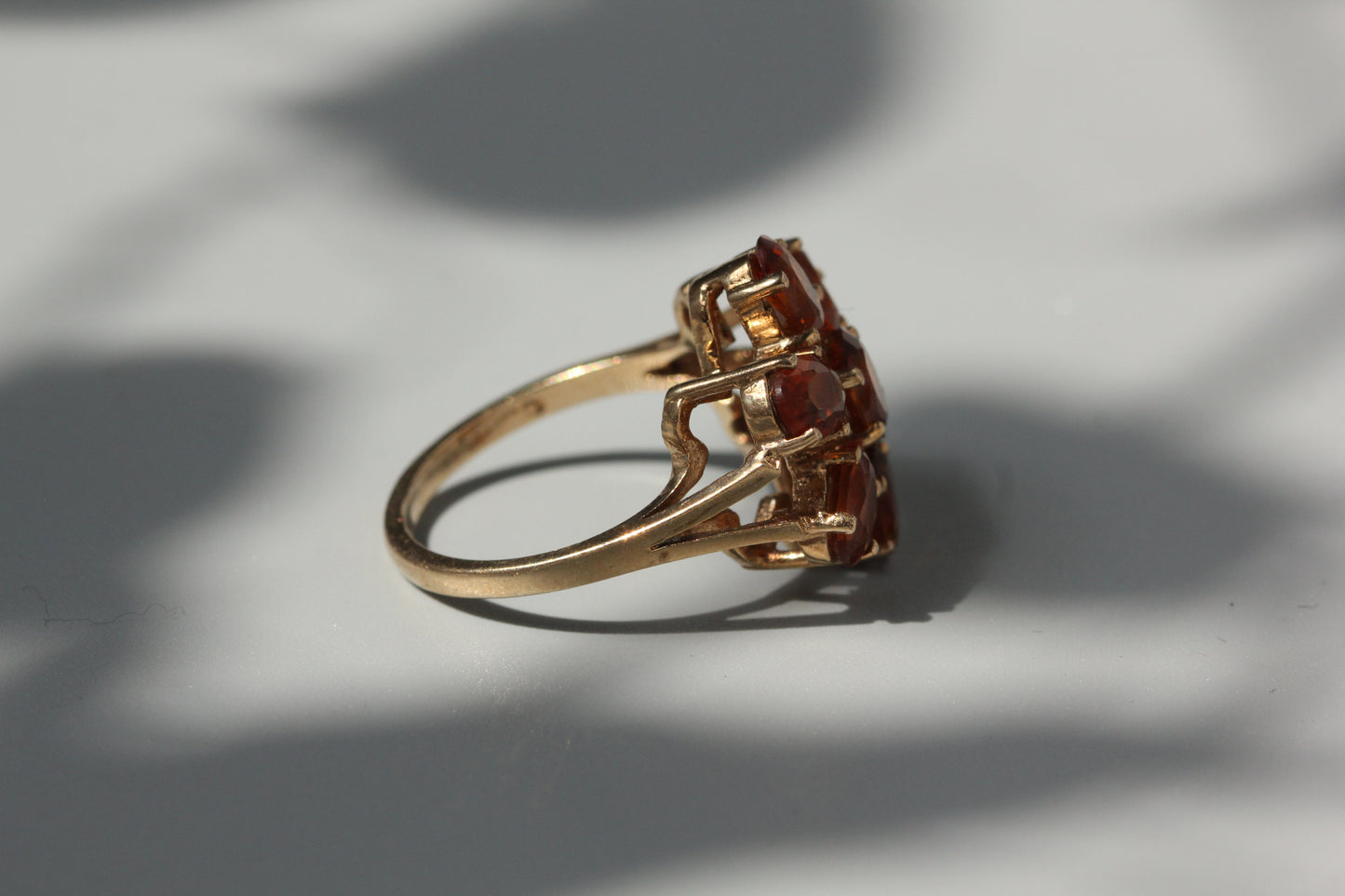 Vintage orange topaz flower cluster ring, in 9 carat gold
