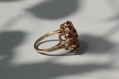 Vintage orange topaz flower cluster ring, in 9 carat gold
