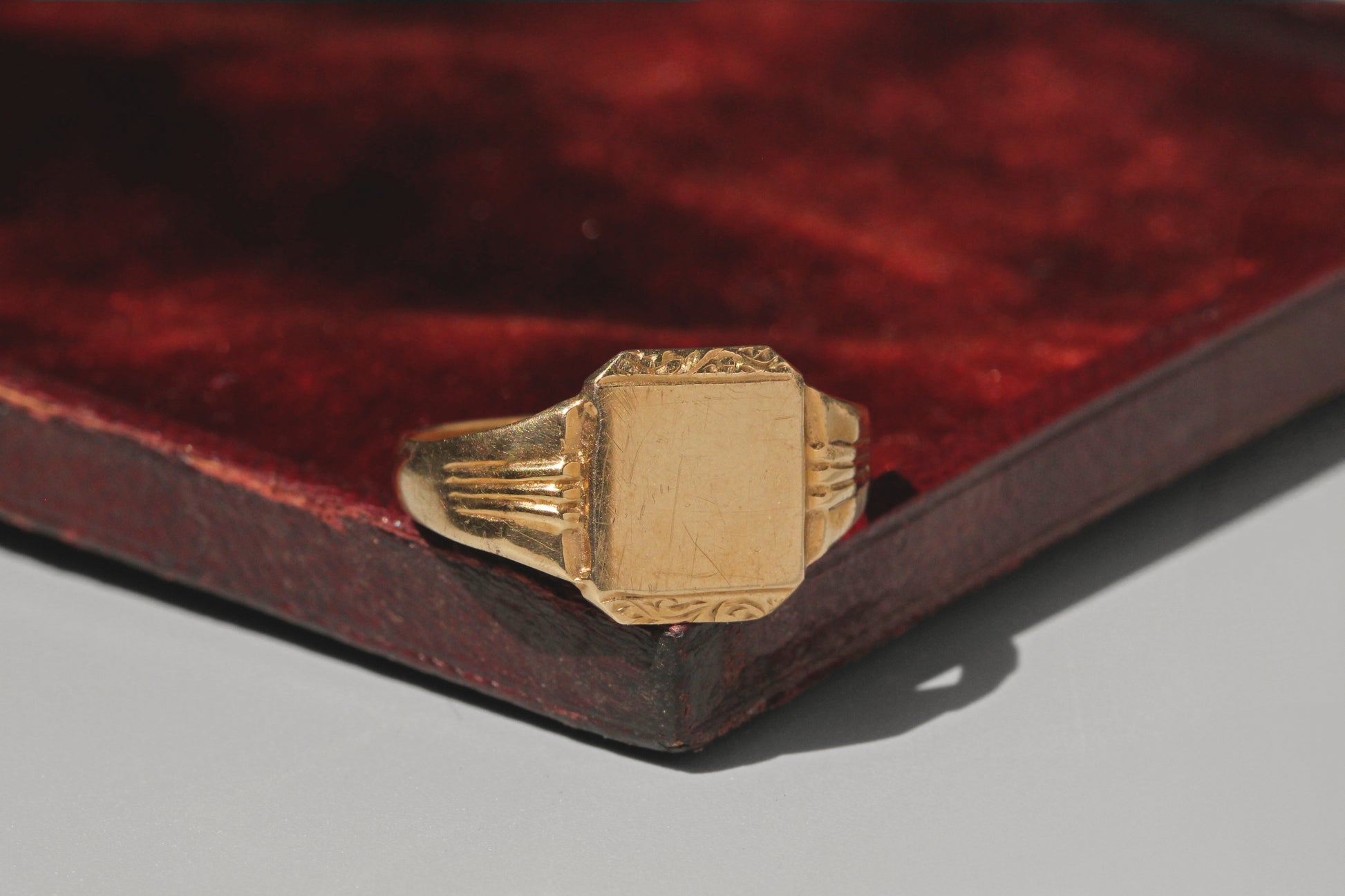 Mid century gold signet ring with chunky shoulders
