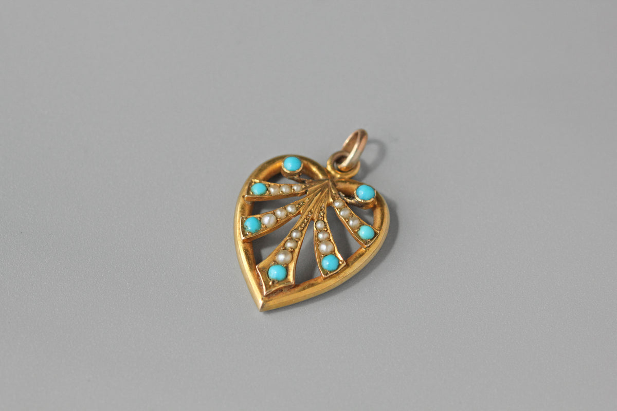 Antique Victorian turquoise and pearl heart pendant in 9 carat gold side view