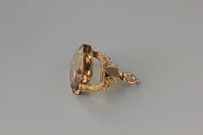 Antique citrine spinning fob seal pendant, in 9 carat gold