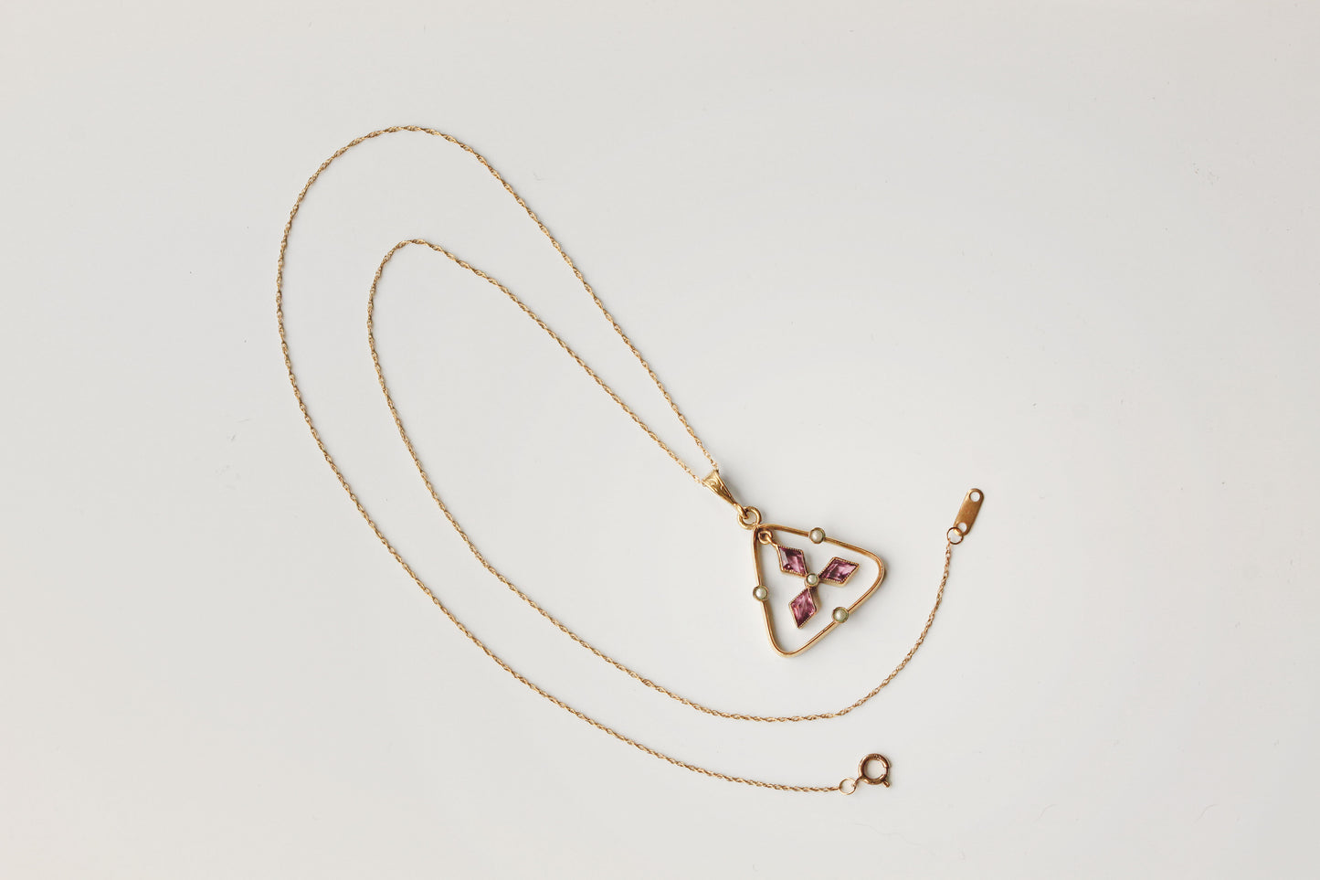 Antique amethyst paste pendant on 9 carat gold chain
