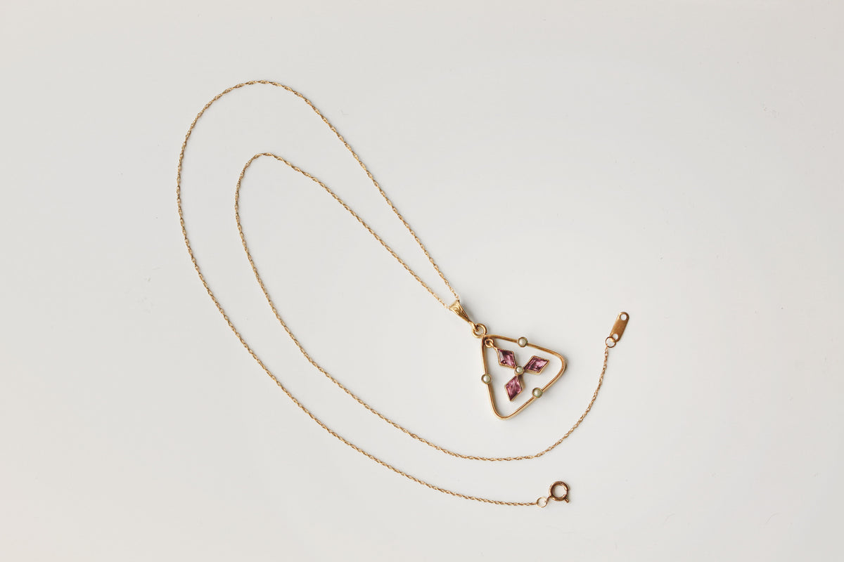 Antique amethyst paste pendant on 9 carat gold chain