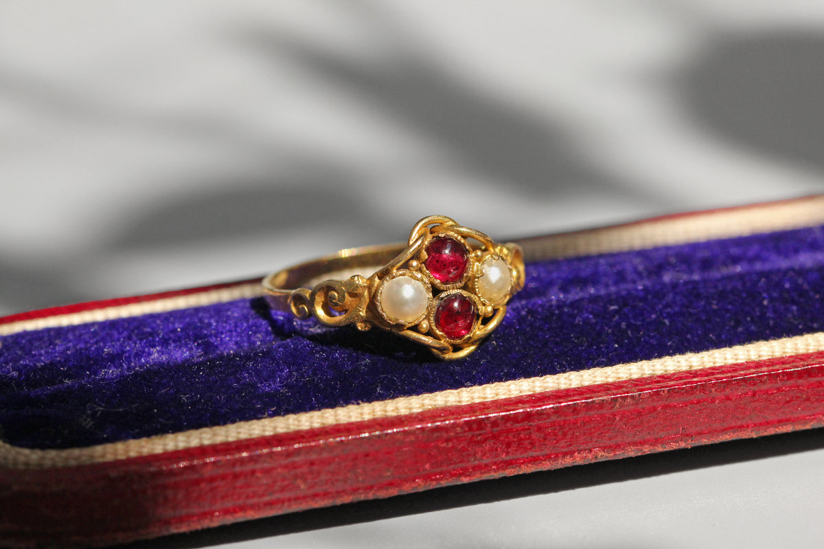 Victorian antique ruby cabochon and pearl ring in 15ct gold on antique jewellery box