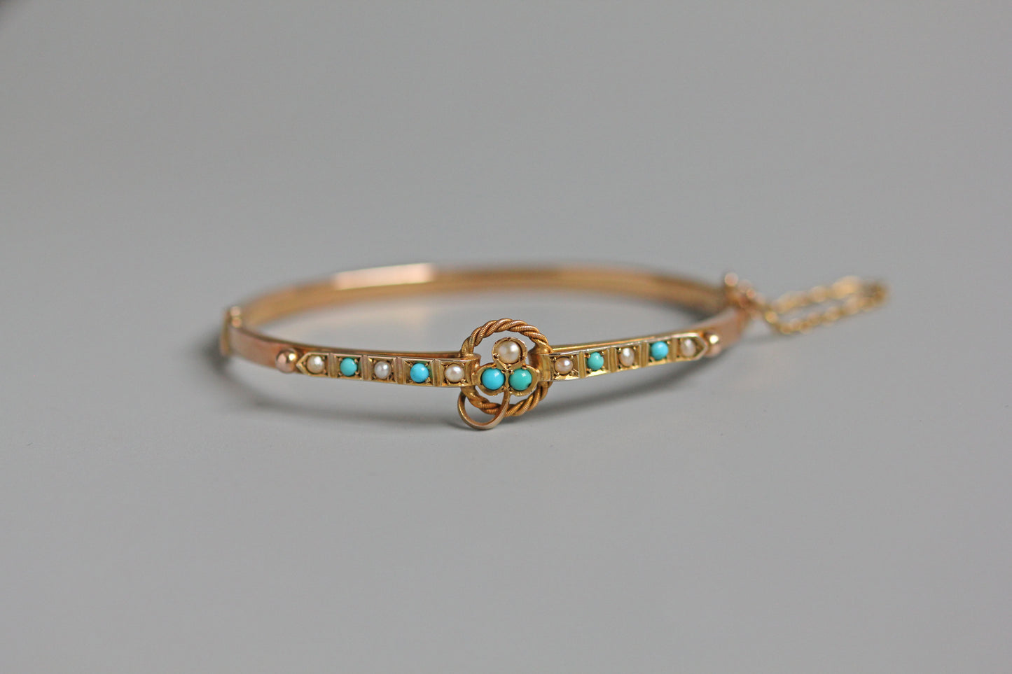 Antique turquoise and pearl ivy or clover bangle, in 9 carat gold