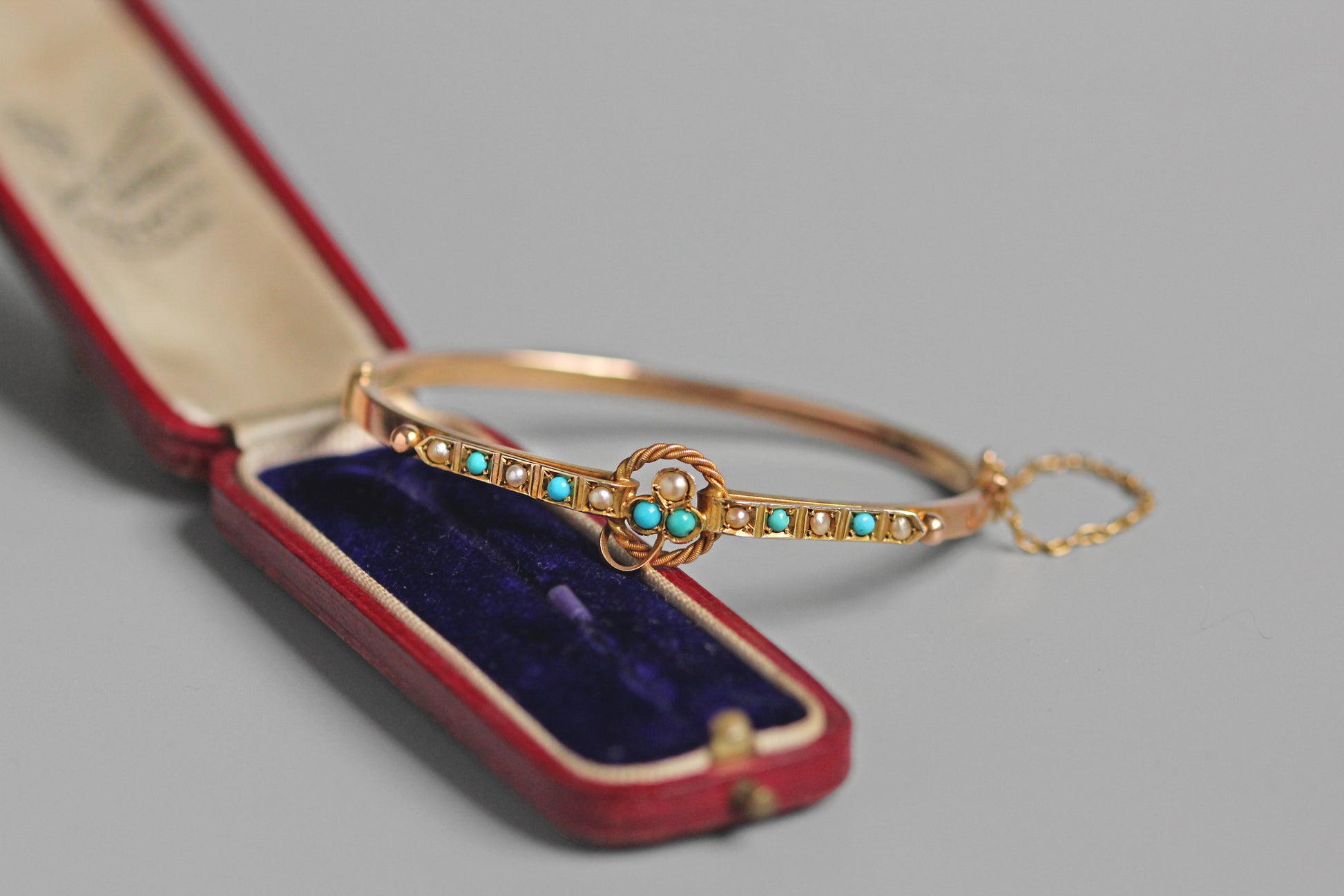 Antique turquoise and pearl ivy or clover bangle, in 9 carat gold