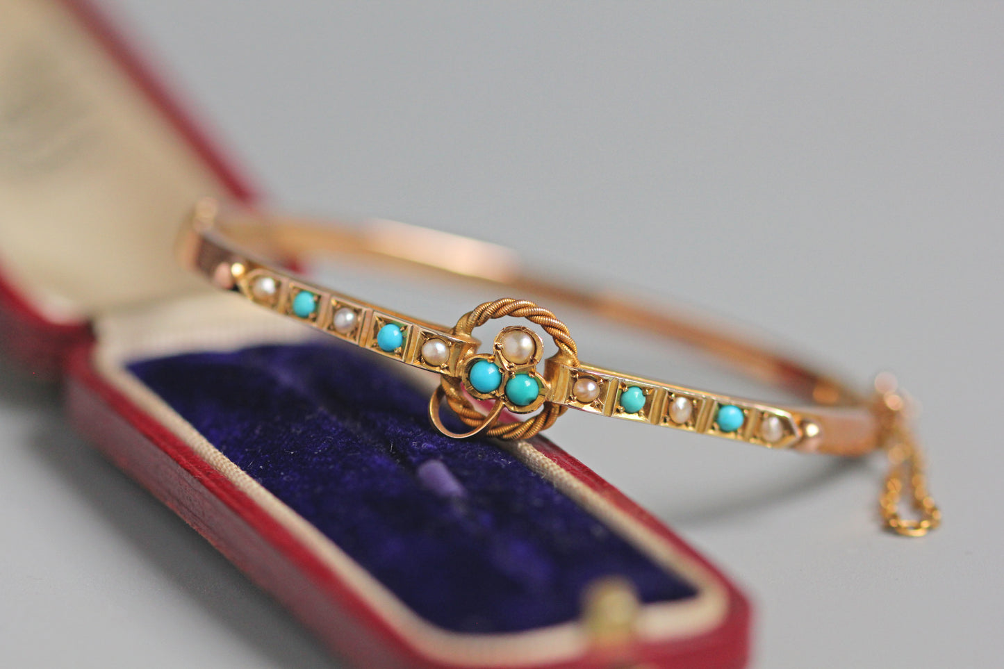 Antique turquoise and pearl ivy or clover bangle, in 9 carat gold