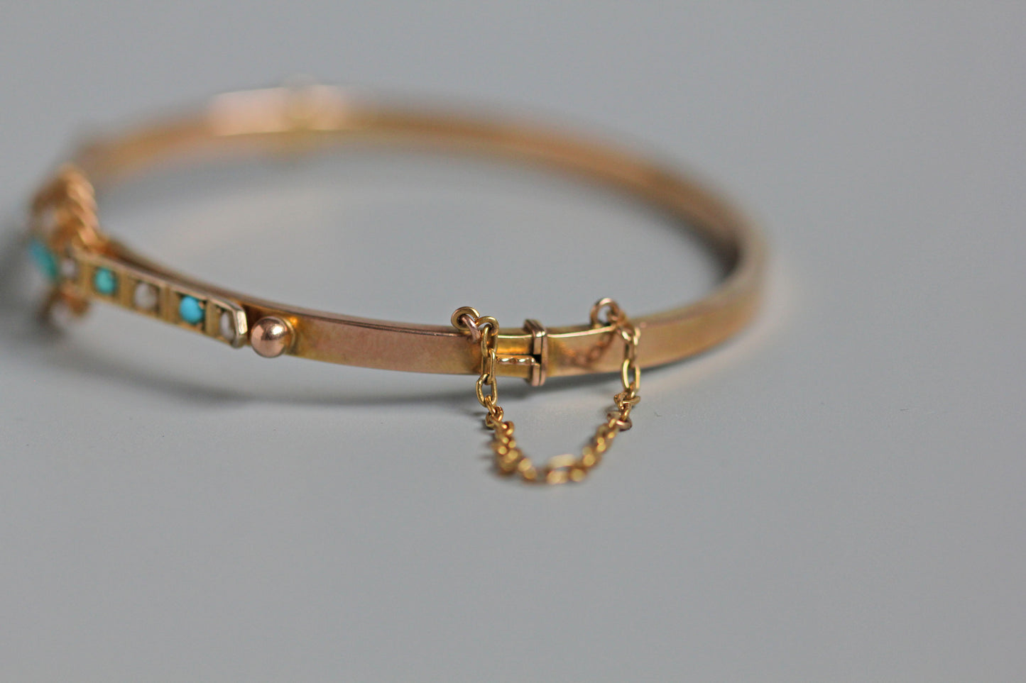 Antique turquoise and pearl ivy or clover bangle, in 9 carat gold