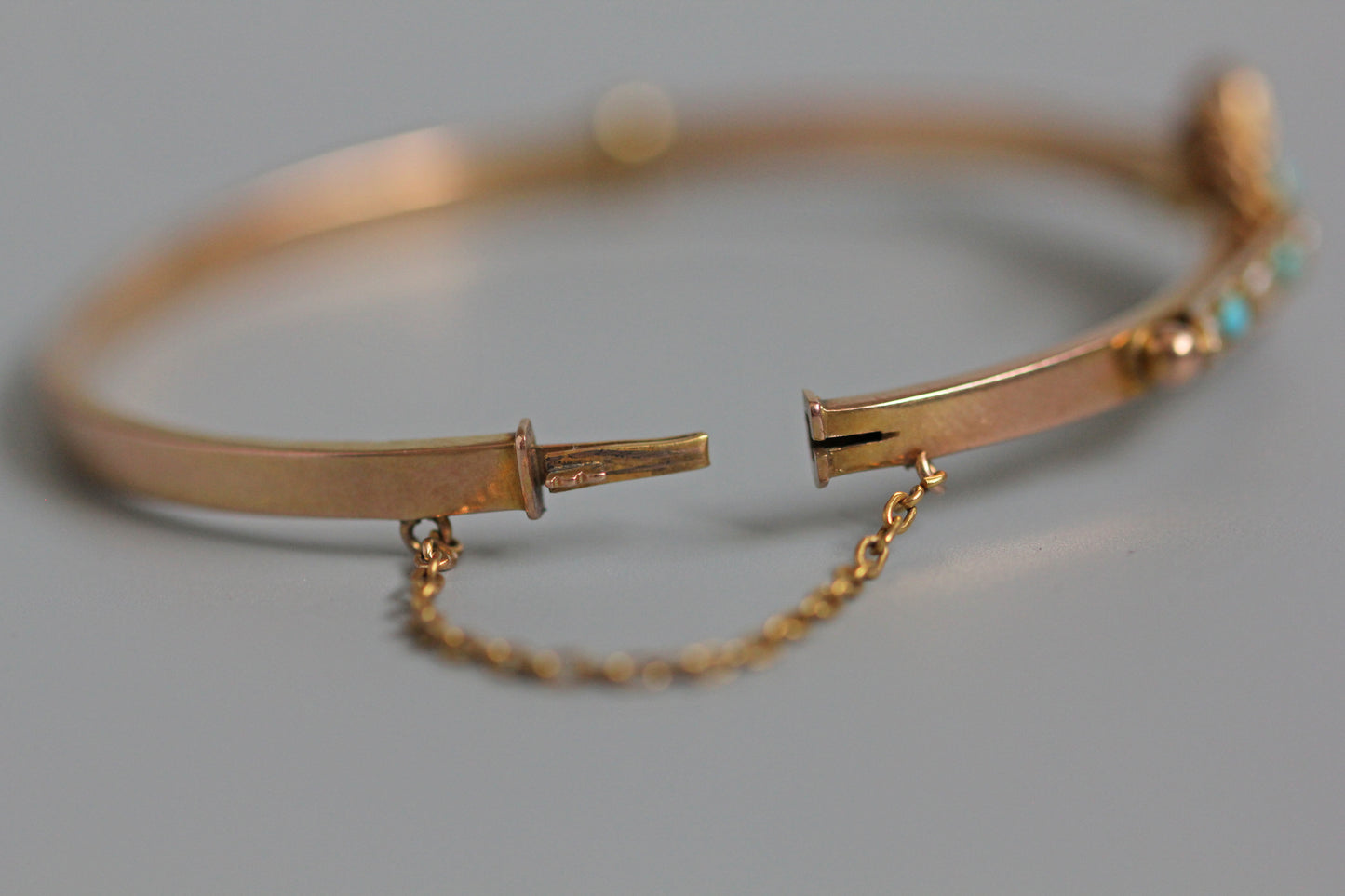 Antique turquoise and pearl ivy or clover bangle, in 9 carat gold