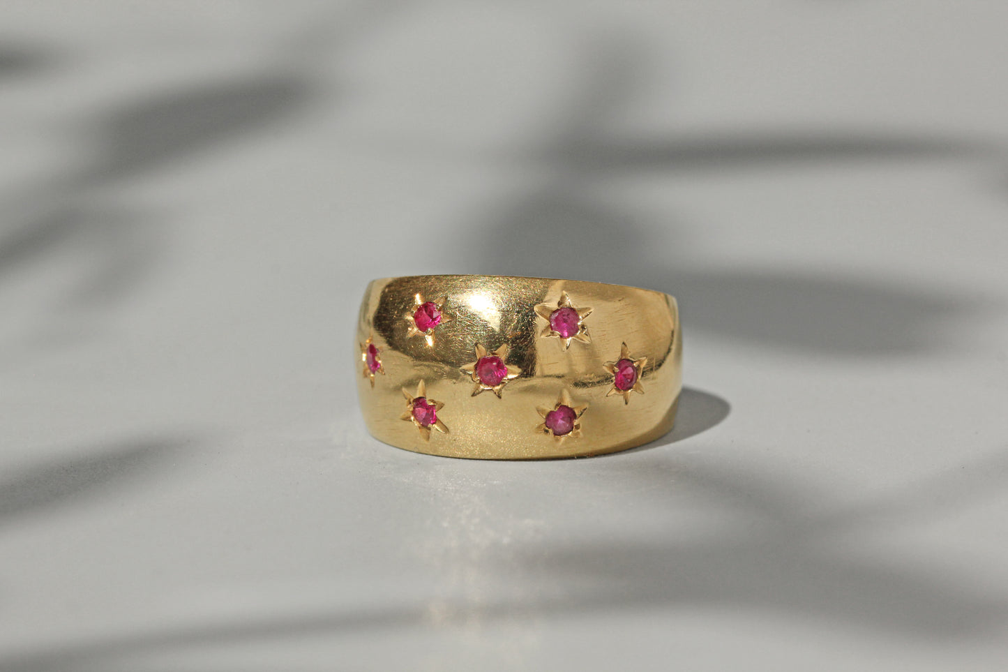 Vintage chunky celestial star set ruby ring, in 18 carat gold