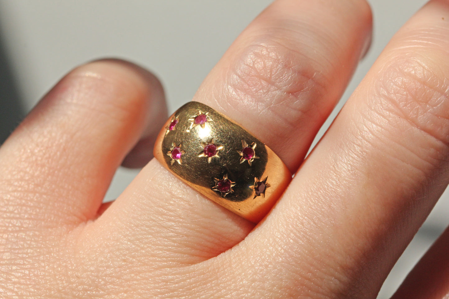 Vintage chunky celestial star set ruby ring, in 18 carat gold