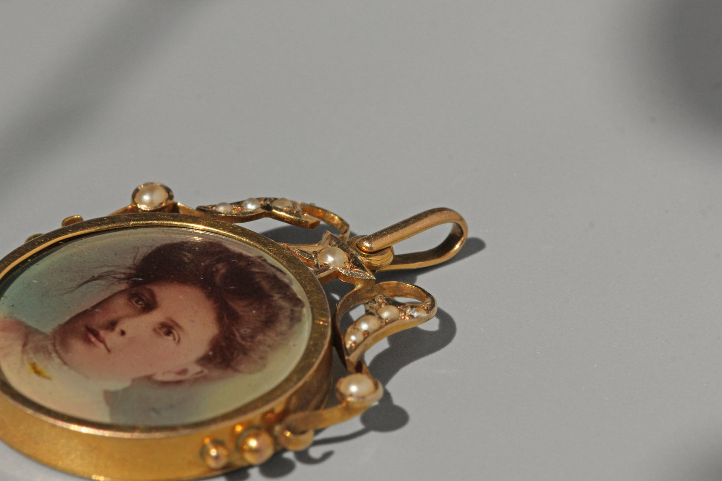 Antique celestial pearl double locket pendant, in 9 carat gold