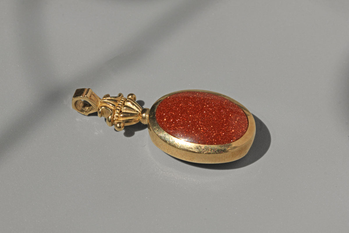 Vintage goldstone fob pendant in 9 carat gold side view