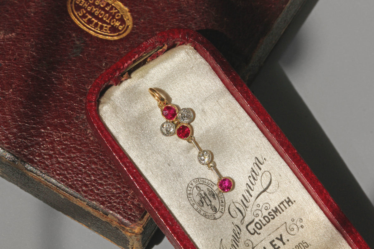 Antique art deco old cut diamond and ruby pendant, in 9 carat gold