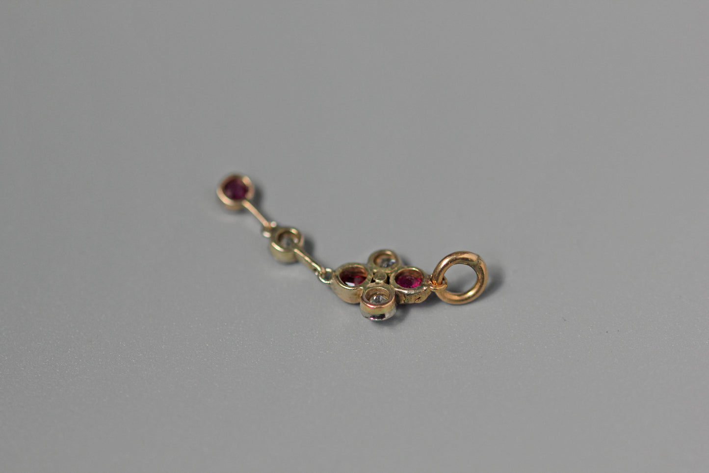 Antique art deco old cut diamond and ruby pendant, in 9 carat gold