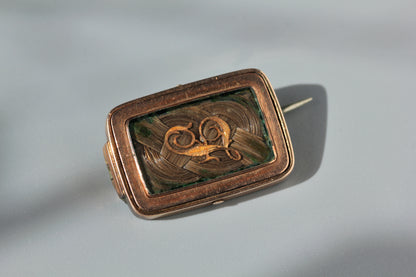 Antique victorian hairwork and silhouette mourning brooch, in 9ct gold
